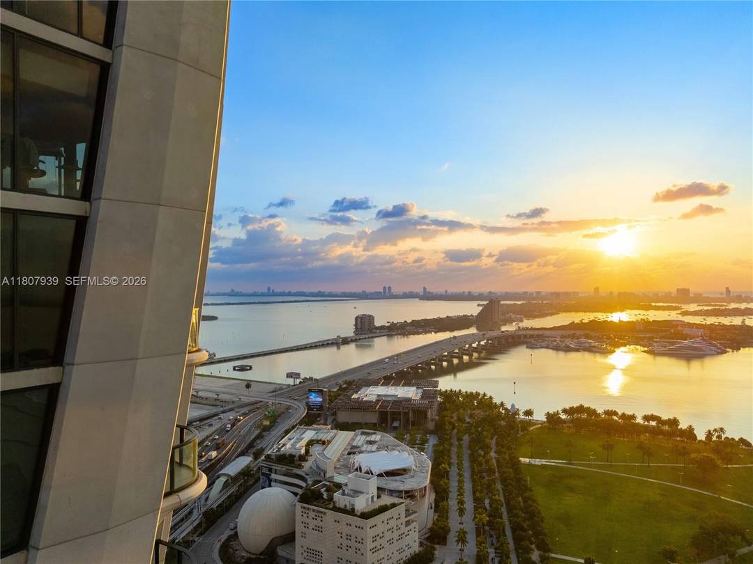 EXPERIENCE TIMELESS SOPHISTICATION WITH SUNRISE TO SUNSET VIEWS OF THE BAY amp ; CITY FROM THIS PROFESSIONALLY CURATED HIGH FLOOR MASTERPIECE !