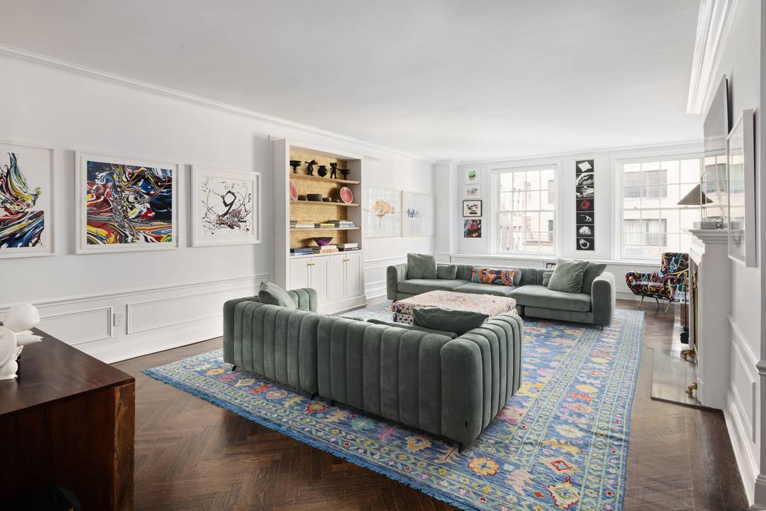 MOVE RIGHT IN. Located directly across the street from the Metropolitan Museum, this beautiful 7 room residence has been lovingly restored to seamlessly blend timeless charm with modern sophistication.