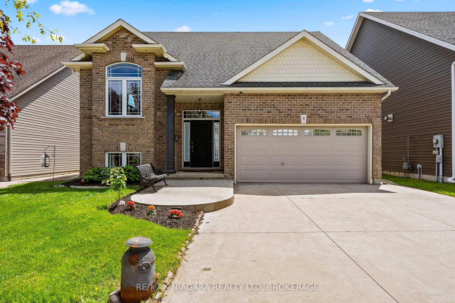 Welcome to 8 Corbin Street, a beautifully maintained raised bungalow located in one of St.