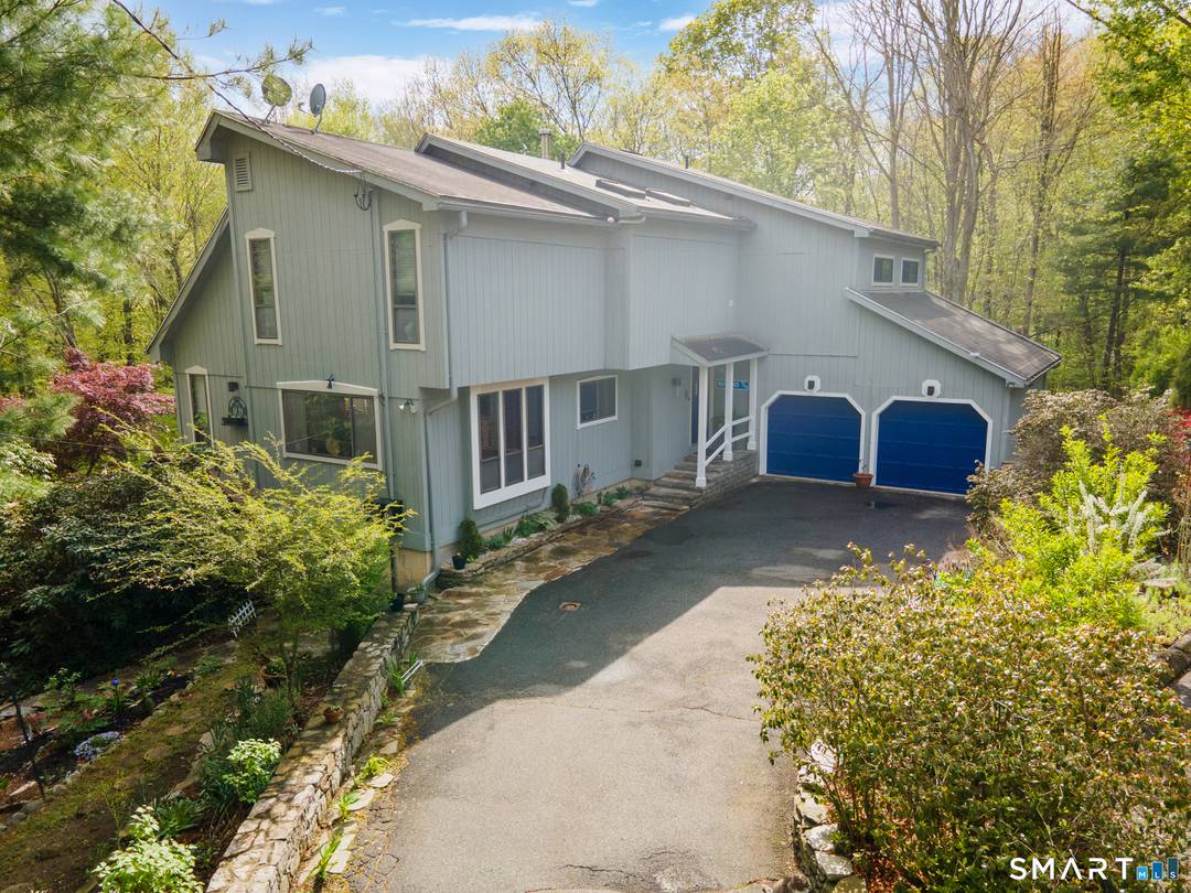 Tucked away on a quiet cul de sac, this spacious 4 bedroom, 3.