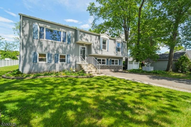 Welcome to this lovely 4 bedroom, 2 bath Bi level home tucked away on a quiet street offering approximately 2, 500 square feet of versatile living space.