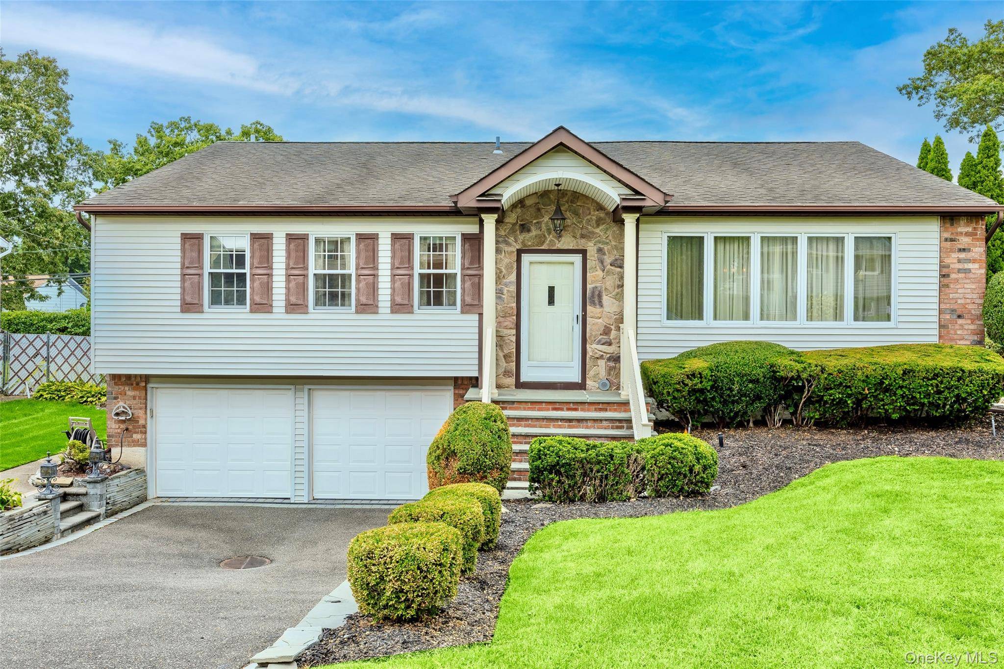 Welcome to your dream home in the heart of Nesconset, NY !
