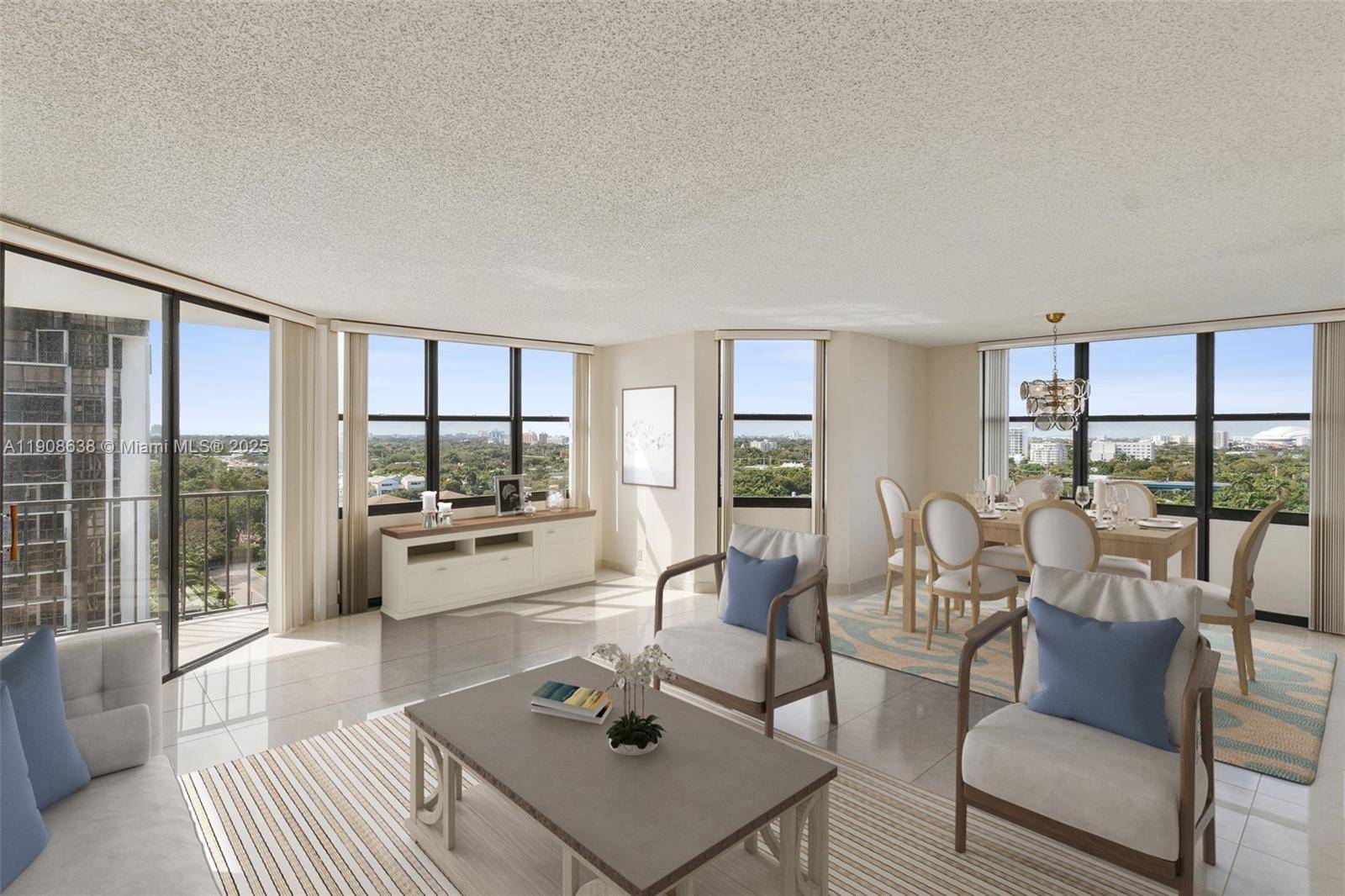 Largest corner unit in Brickell Place Bldg B with expansive Biscayne Bay views and city skyline.