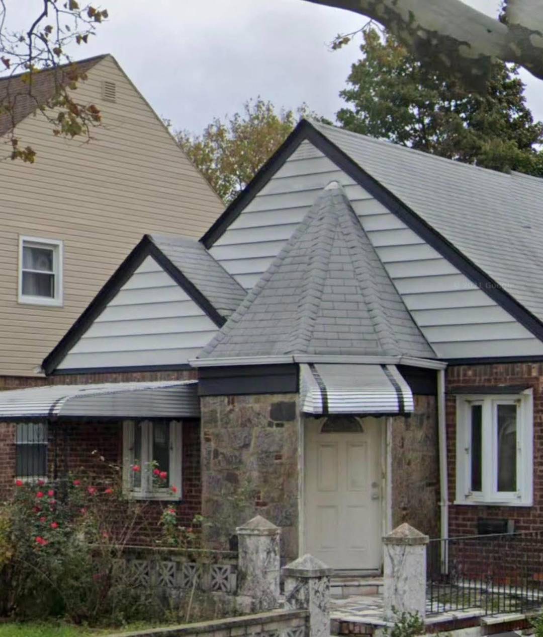 HAS AN APARTMENT IN THE BASEMENT, 4 BEDROOMS AND 2 FULL BATHS.