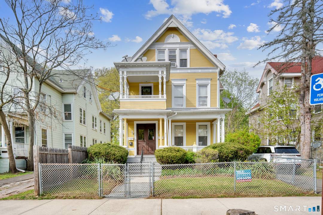 Rare opportunity to own a character filled multi family home offering timeless craftsmanship and exceptional space !