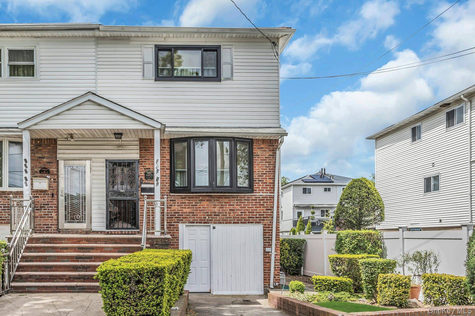 Ready To Entertain ! The Cul de sac Has A Lovely Two Story Single Family, Semi Attached, Brick and Vinyl 3 Bedroom, One and One Half Bathroom Townhouse.