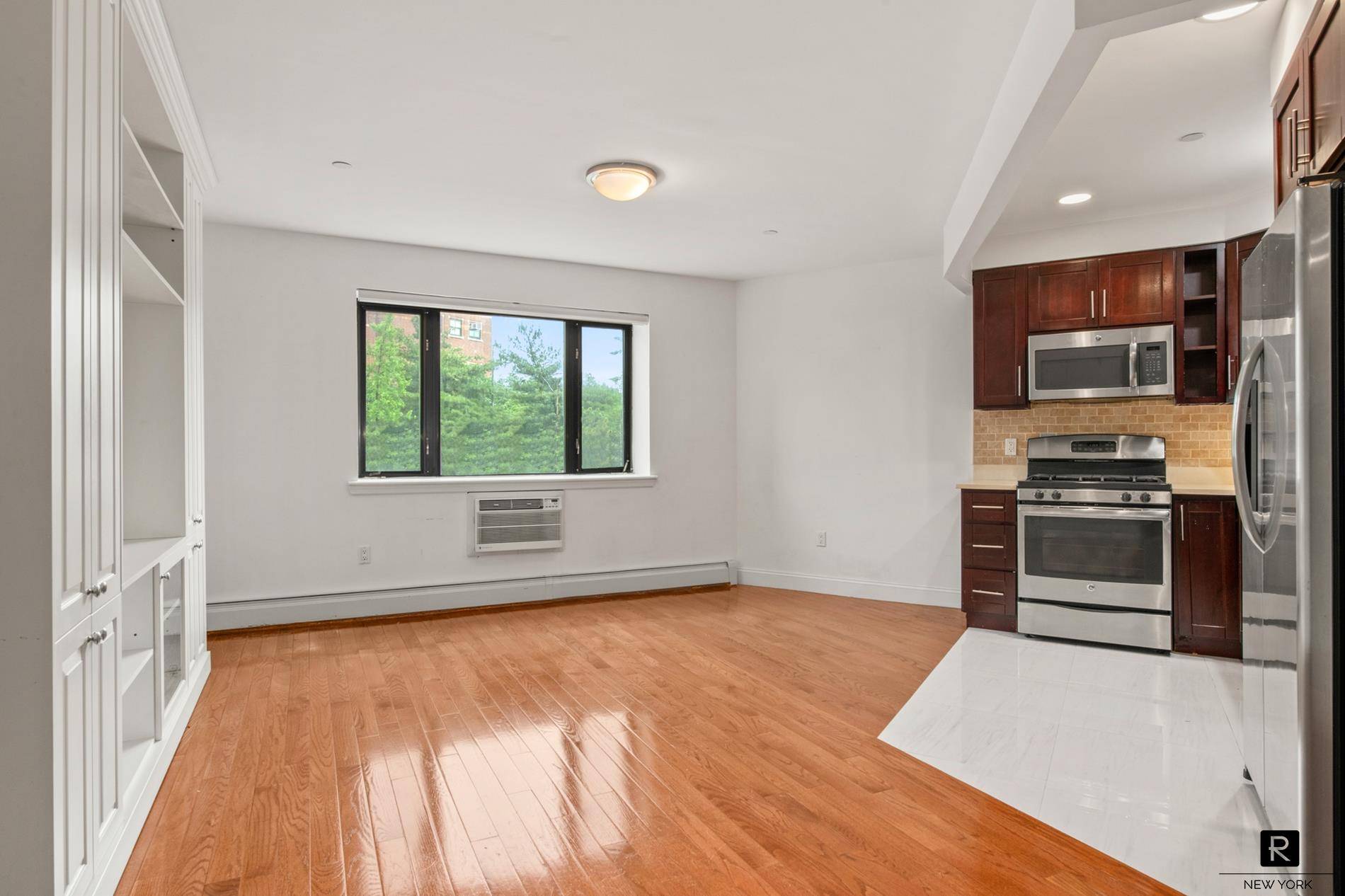 Bright, Spacious 2BR 2BA Condo with Modern Finishes amp ; Full Service Amenities in Washington HeightsWelcome to your sun drenched sanctuary in the heart of Washington Heights.