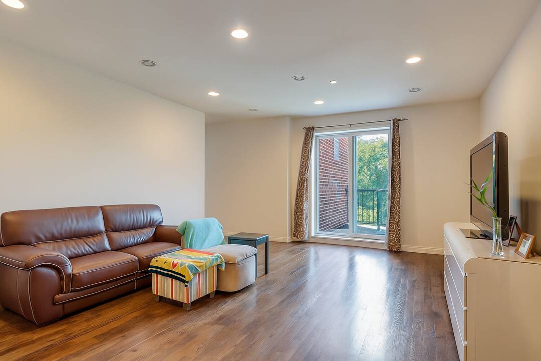 Welcome to Residence 7G at The Waterfalls a spacious, sun filled home offering indoor deeded parking, in unit laundry, and the added benefit of an 11 year tax abatement.