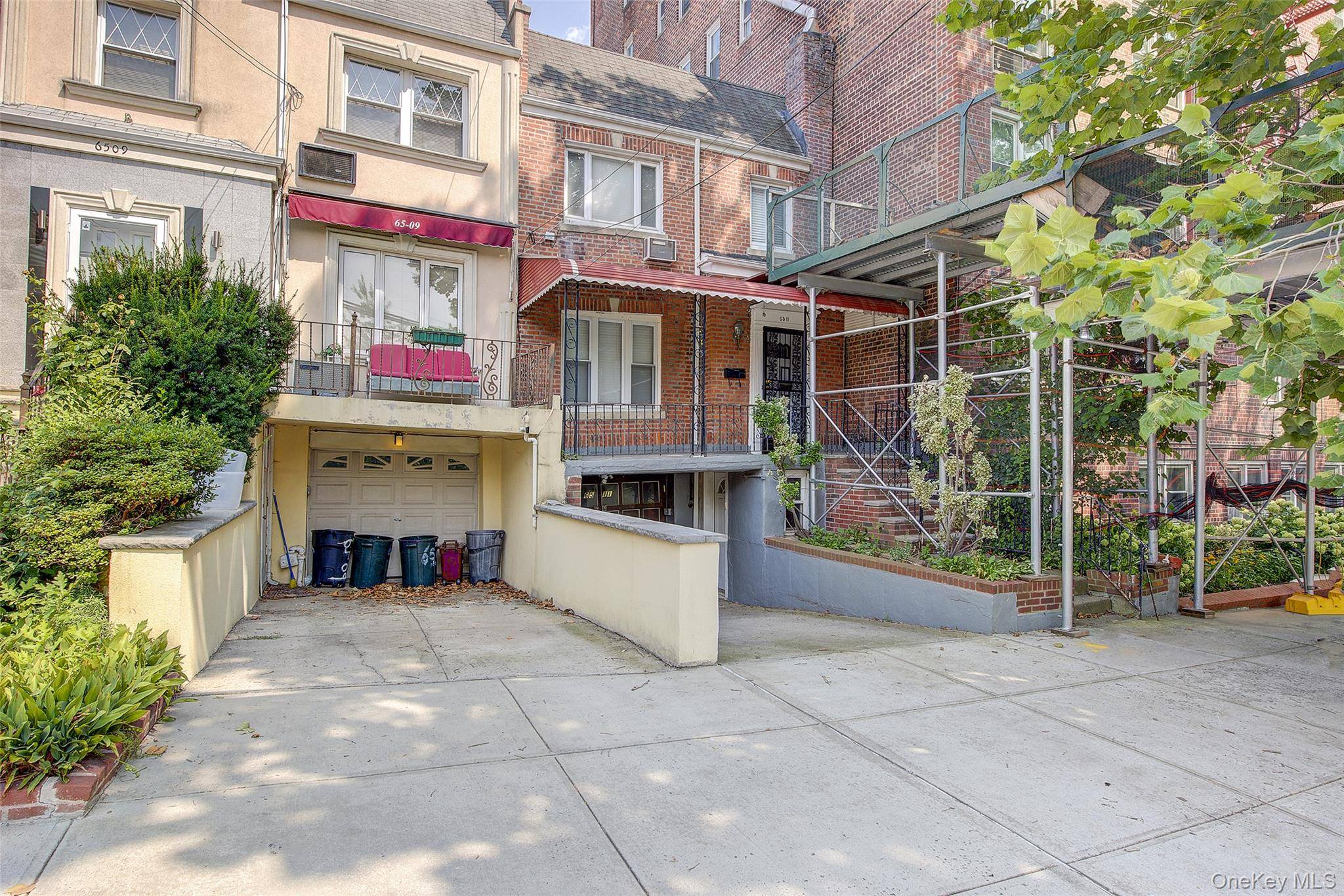 Spacious 3 bedroom house with private driveway, large front porch, above grade basement, and oversized backyard.
