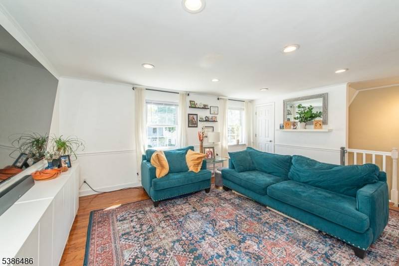 Beautifully updated 2 bedroom, 1 bath second floor condo featuring its own private entrance for added convenience and privacy.