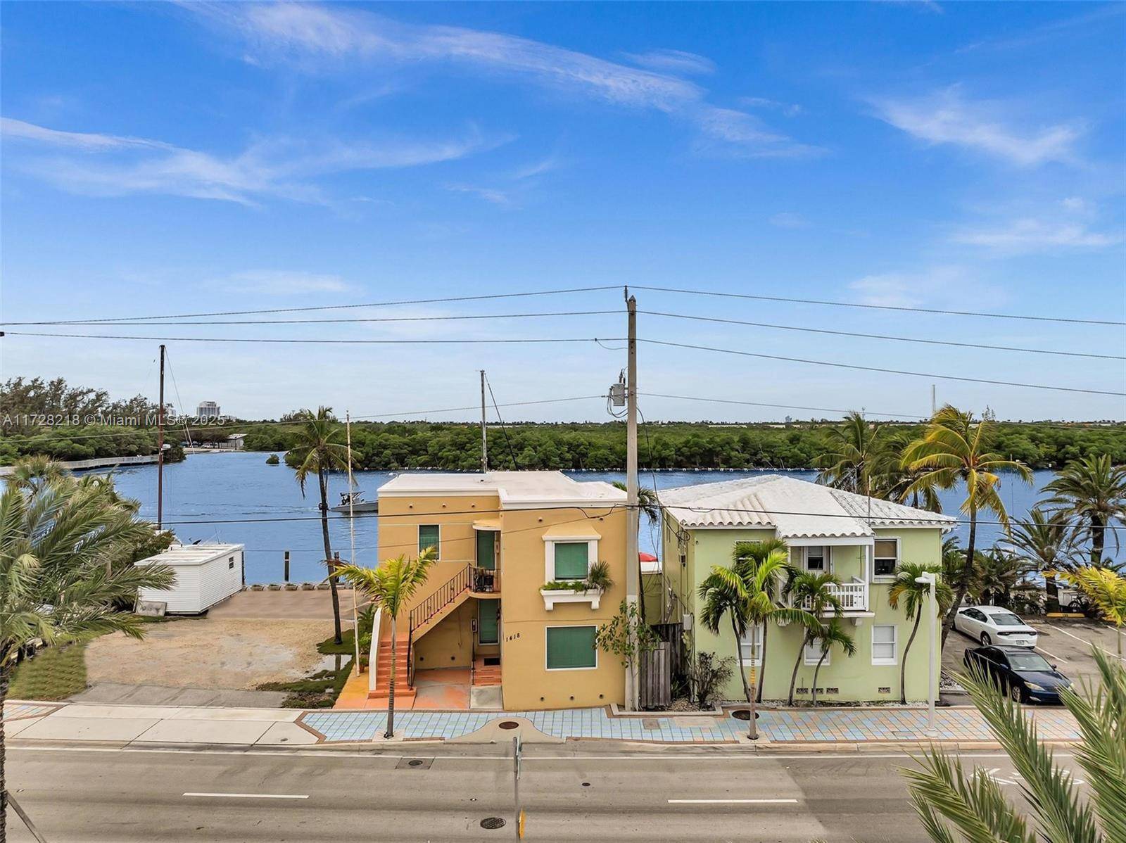 Modern 2 story duplex with 3 incomes plus boat dock.