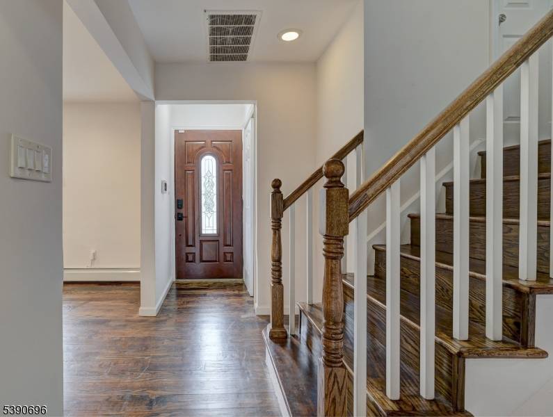 This sun filled split level home offers 3 4 bedrooms and 3 full baths with a wonderful open layout.