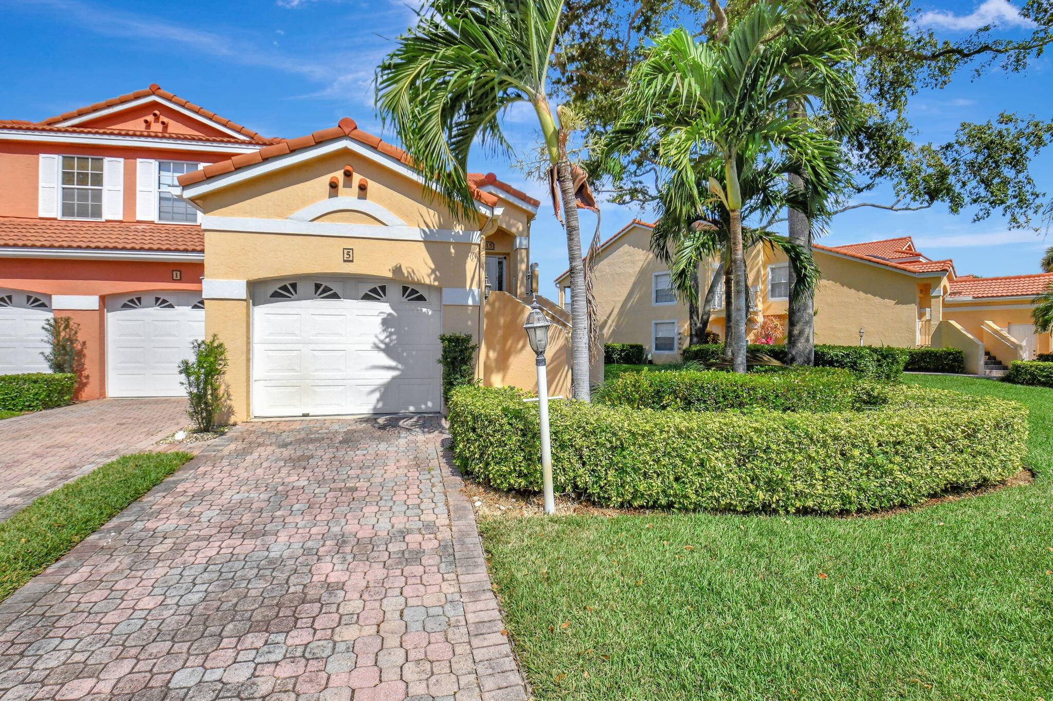 Warm and inviting home with vaulted ceilings, with golf and water views !
