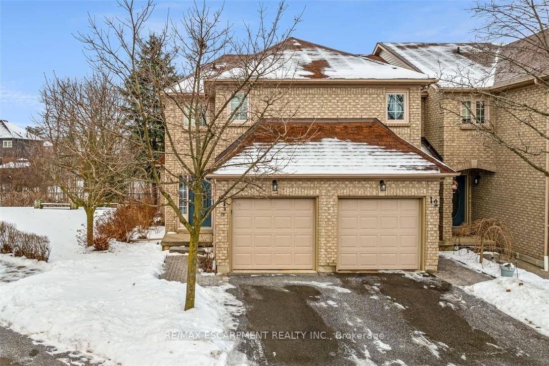 Discover this stunning end unit townhouse nestled in a sought after community, backing onto serene greenspace for ultimate privacy.