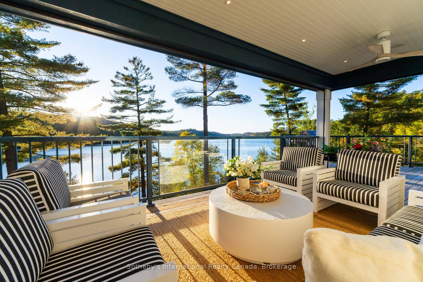 Embrace breathtaking sunsets with over 650 feet of southwest facing frontage on beautiful Lake Vernon.