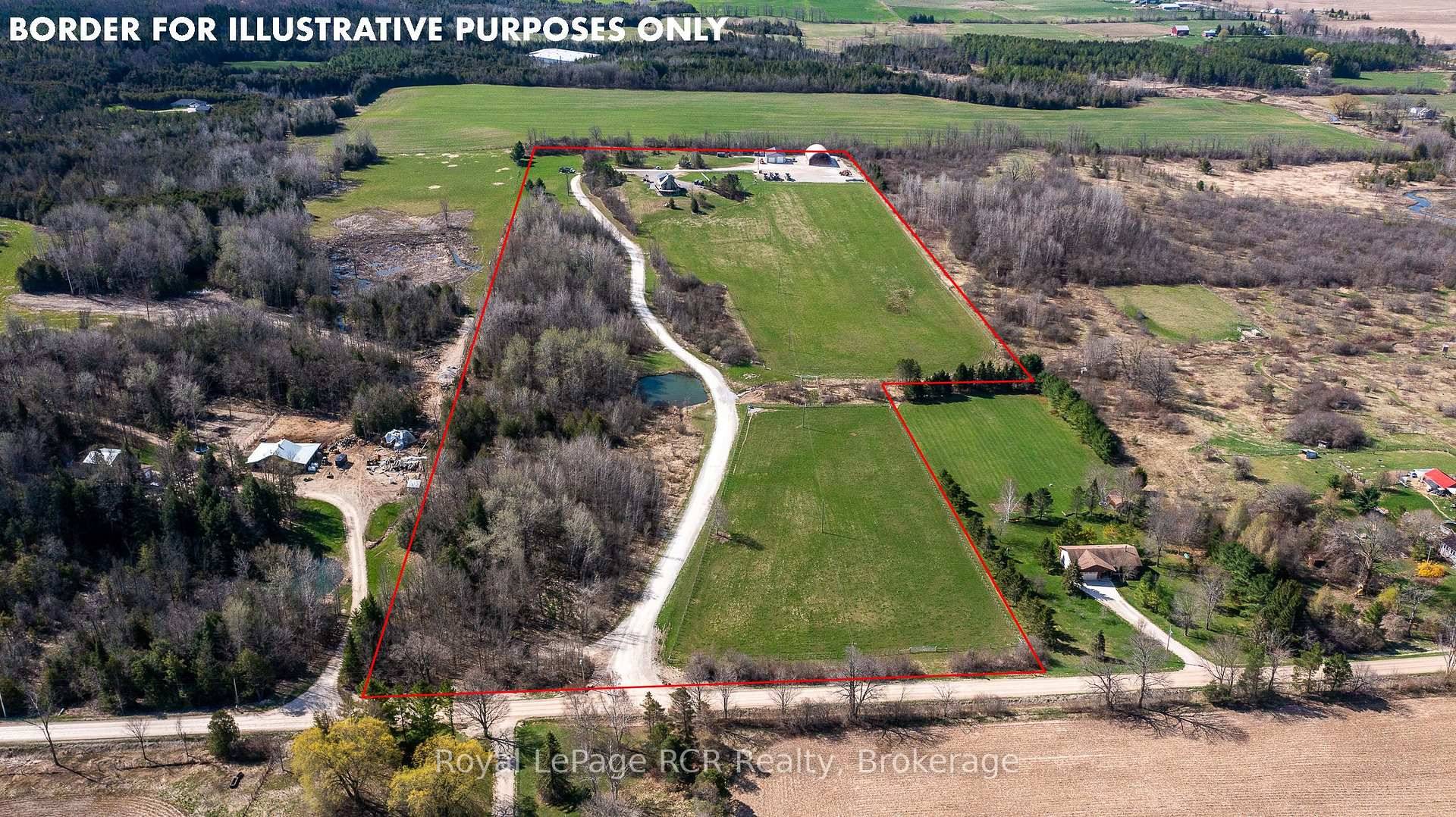 27 acre farm with a shop, storage building and home.