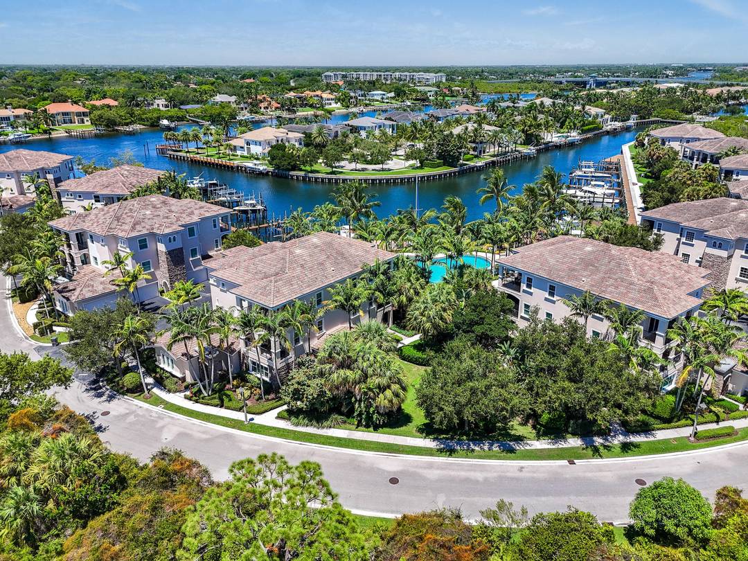 Discover the pinnacle of waterfront living in this rare offering within the prestigious, gated community of Frenchman's Harbor.