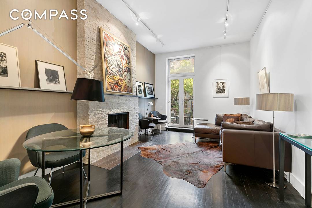 This thoughtfully renovated Gramercy pre war triplex home has style to spare, and features you don't normally find at this price.