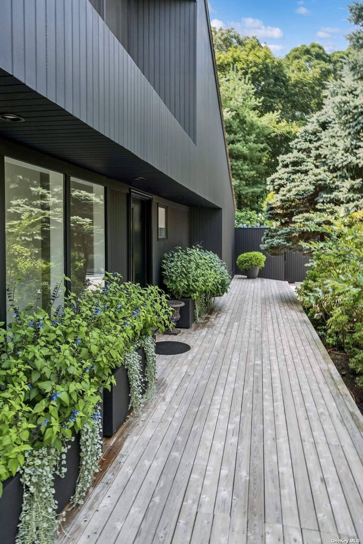 Custom built contemporary residence in Sag Harbor nestled at the end of a serene drive off Deerfield Road, this light filled property offers an exceptional blend of luxury, comfort, and ...