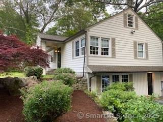 Lovely 2 3 BR ranch with finished walkout level space on a serene private lot, offers the perfect blend of modern elegance and country charm.