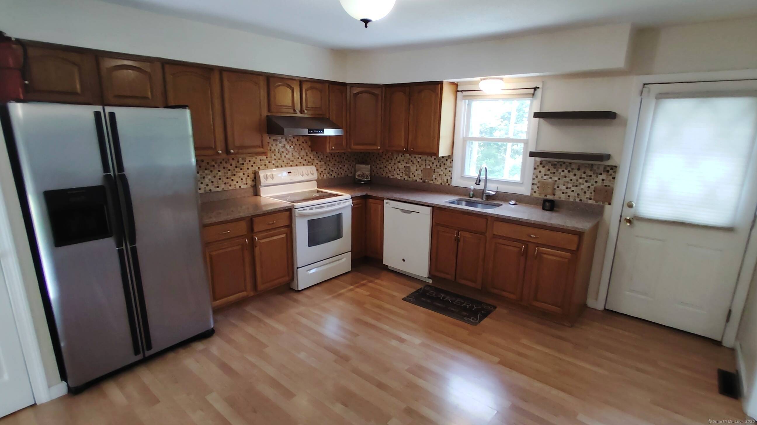 Located in one of the most sought after neighborhoods in North Haven, this 1, 956sf home is sure to check all of the boxes on your list.