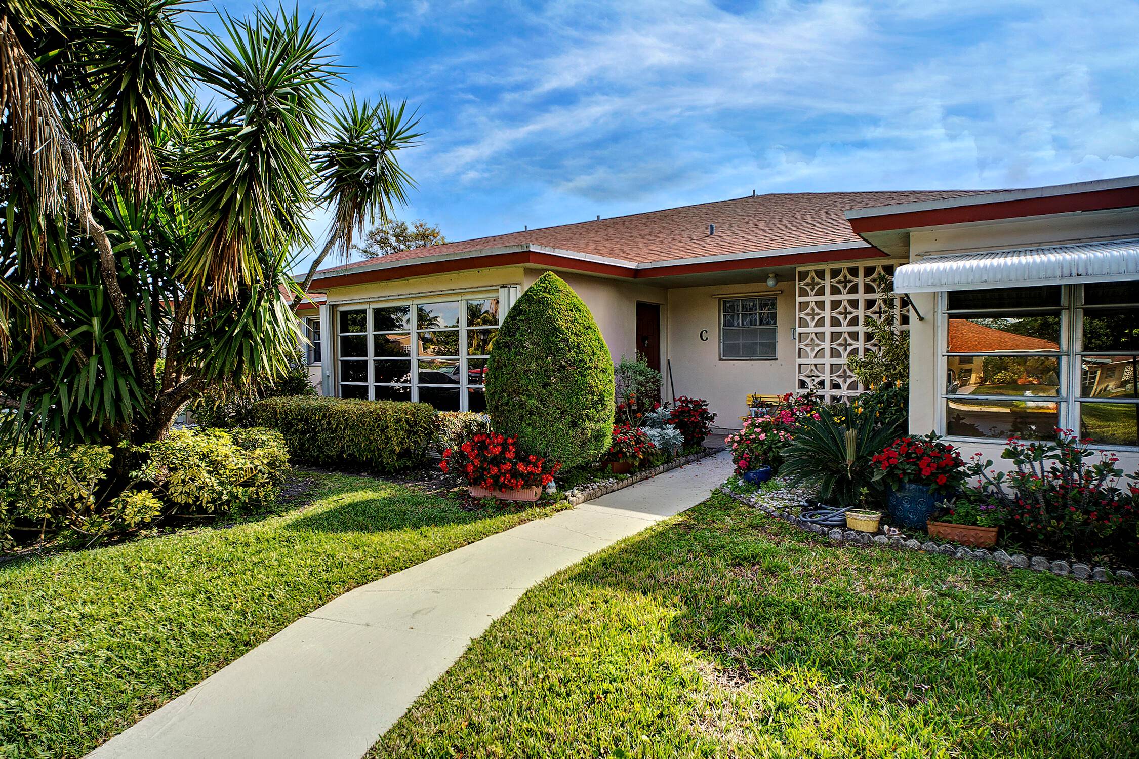 Neutral Tile and Carpet Throughout Living Areas, New Electrical Panel, Accordian Shutters, Newer Water Heater, Well Cared For Unit, Short Stroll to Clubhouse Pool, 55 Community, No Rentals First 2 ...