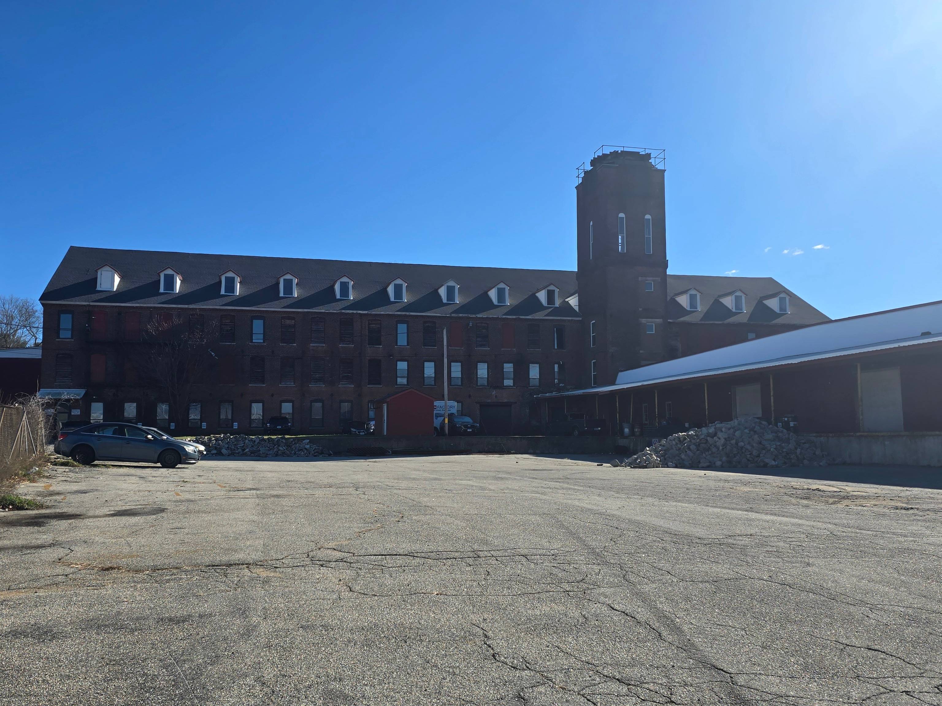 Over 100, 000 sq ft of commercial industrial space across three buildings on 11.