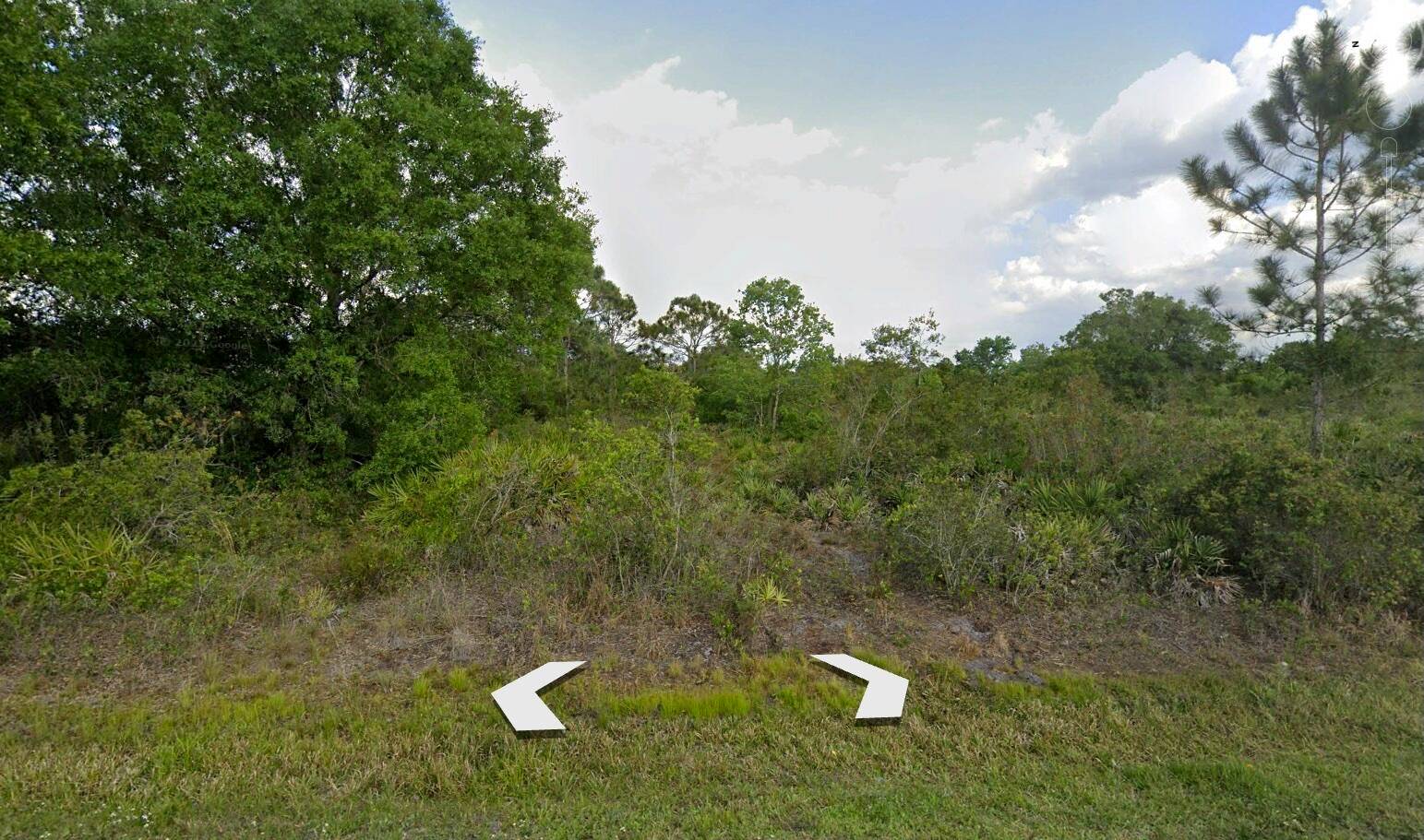 Raw land building lot just north of town in Orange Blossom Ranches.