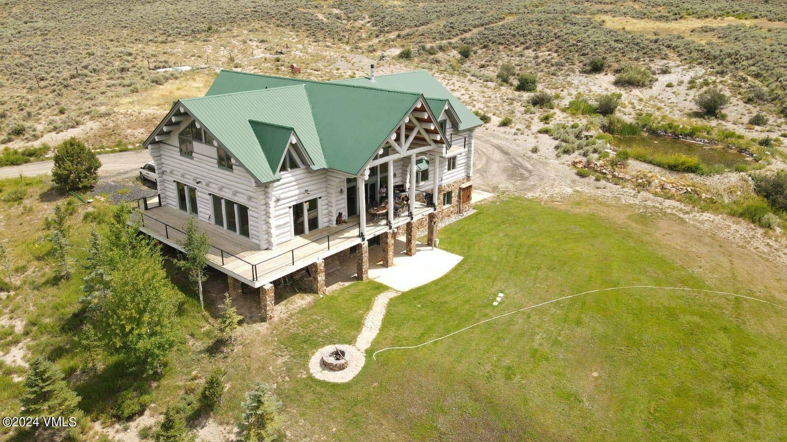 35 Acres with a Montana Log home !