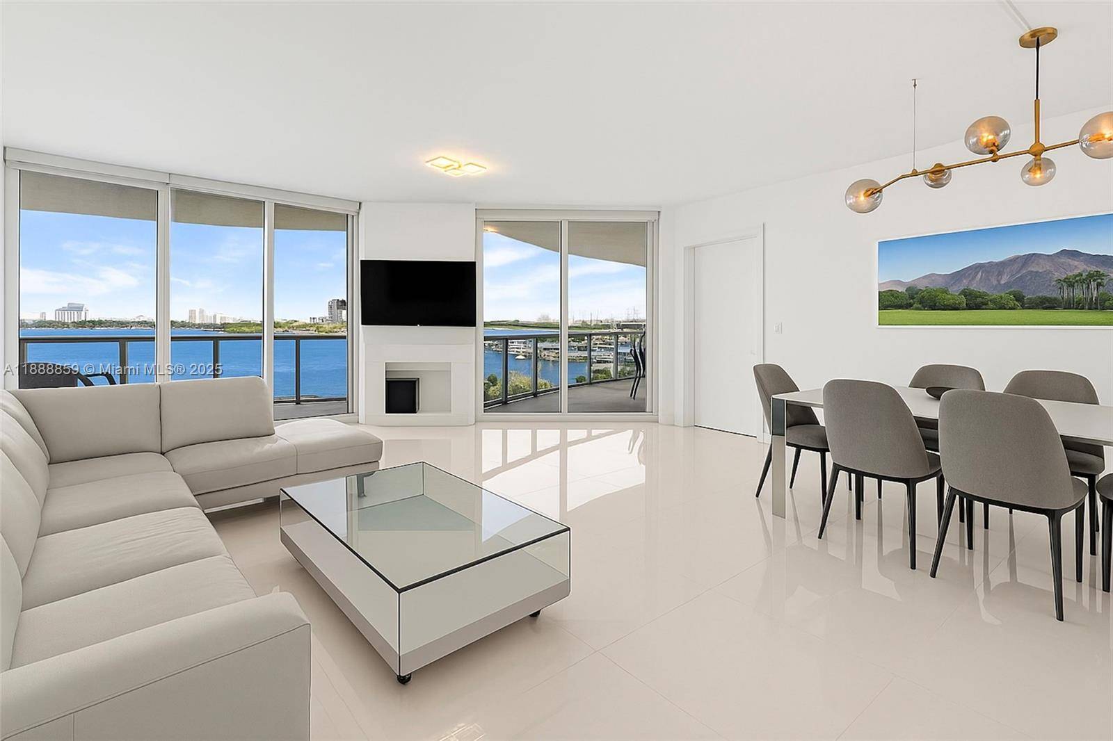Discover unmatched value with this 2 BR Plus EXTRA Den Room residence offering direct, unobstructed bay views, a rare find with no risk of future obstructions at Aria on the ...