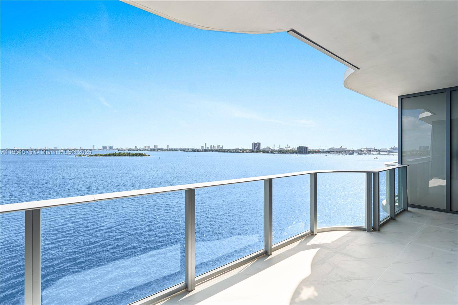 Elevated luxury in this waterfront 1BR Den, 2BA residence at Aria Reserve.