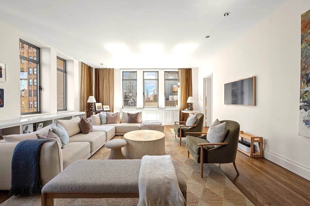 Enjoy a quintessential Chelsea loft lifestyle in this expansive sun splashed corner home.