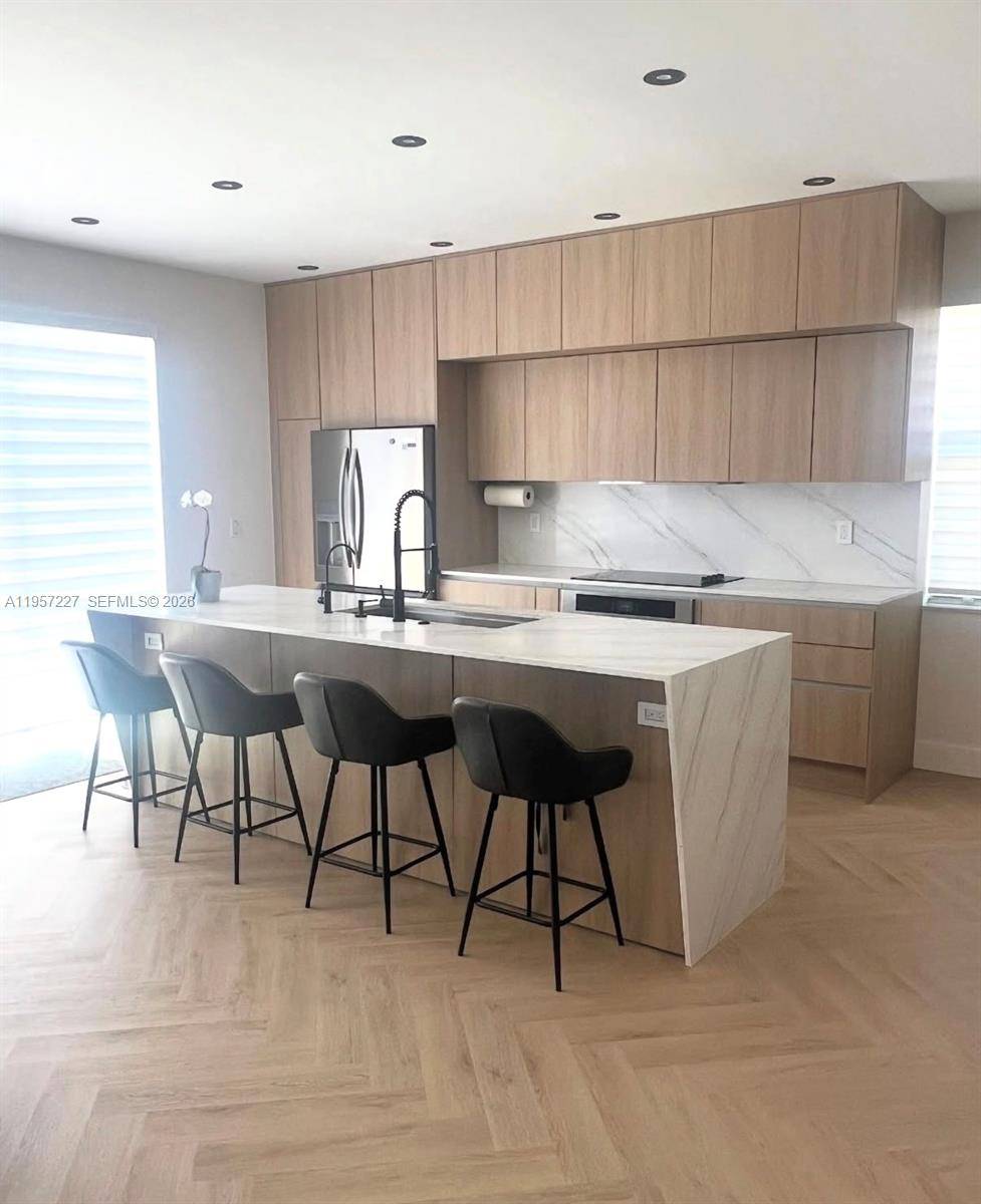 Move in ready. Beautiful Completely remodeled 5 bedroom Home, Luxury vinyl floors throughout, New kitchen, beautiful fully remodeled bathrooms, laundry and patio.
