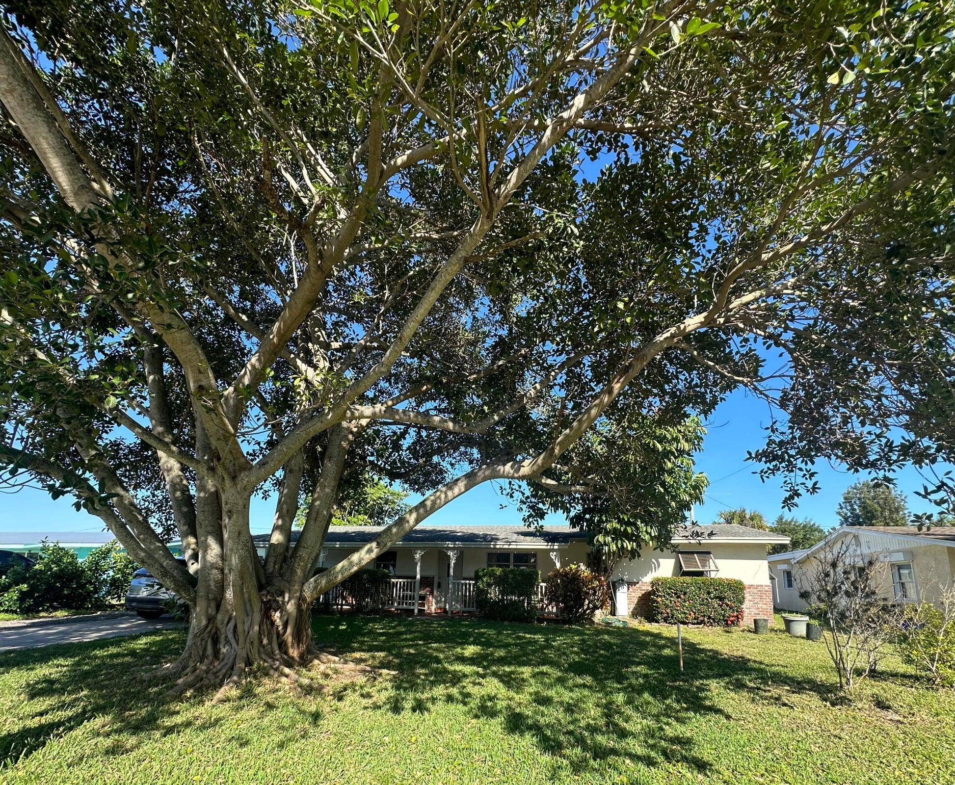 Welcome to your updated and spacious oasis at 1455 Northeast Silver Maple Way, nestled in the heart of beautiful Jensen Beach, FL.