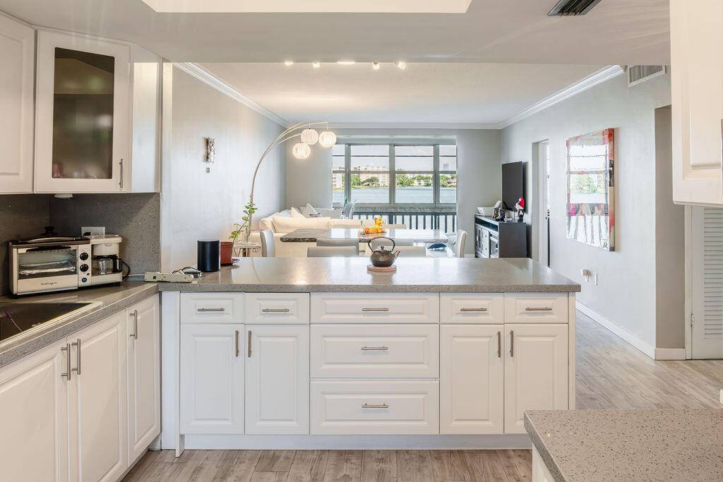 Rarely available 2 bedroom unit with amazing lake views in the desirable Sixth Moorings Condominium.