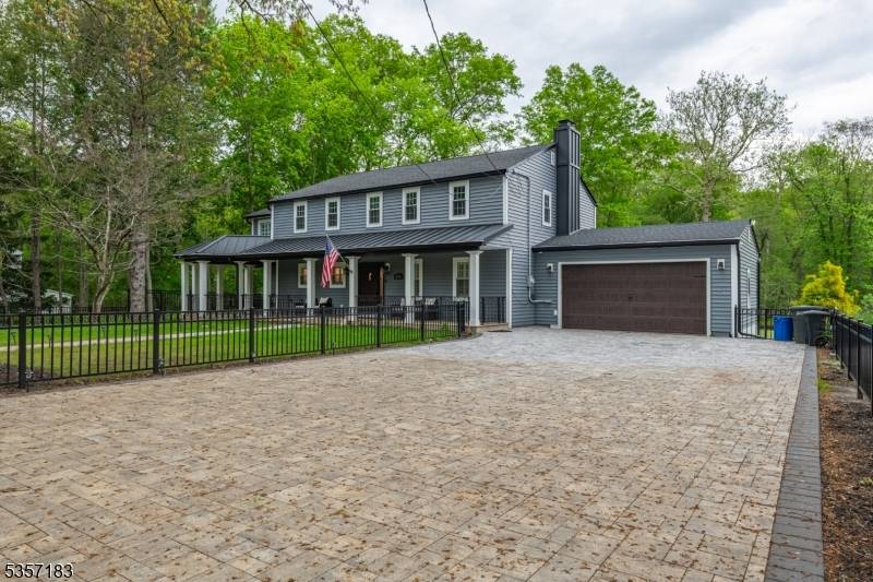 The minute you pull onto the paved driveway and notice the wraparound porch you will know you are home.