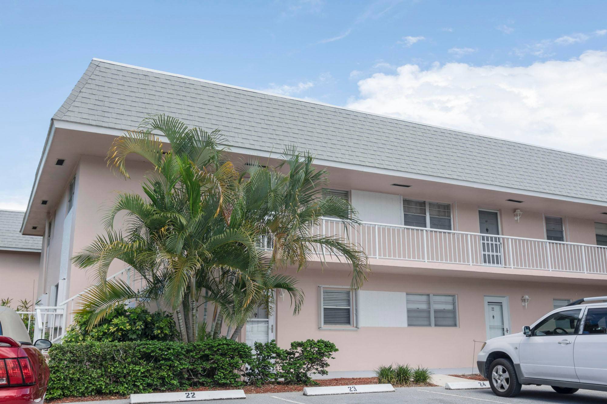 Terrific 55 living ! Extra bright end unit in popular Little Club with 9 hole golf, shuffleboard, courts and spa like pool included with HOA.