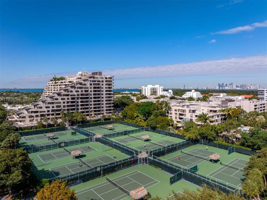 Experience the height of island living with a rare and extraordinary opportunity at the prestigious Emerald Bay at Key Colony on Key Biscayne.