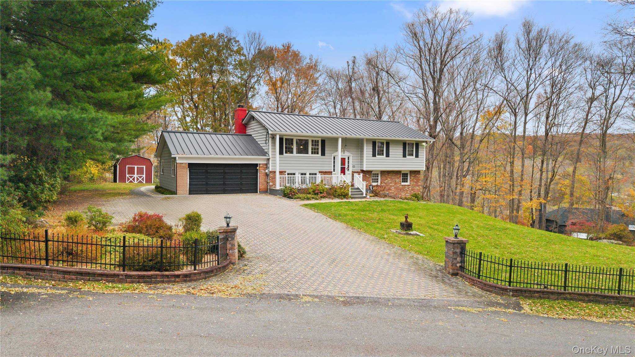 Welcome to this beautifully maintained raised ranch in the heart of North Salem.
