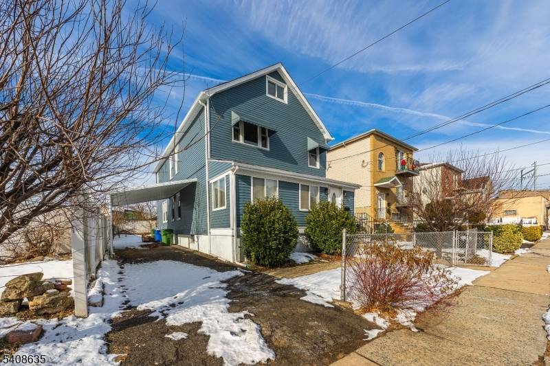 Fully renovated two family home showcasing modern finishes and true move in ready appeal.