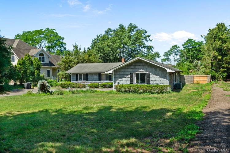 Sprawling 4 Bedroom, 2 Bath Ranch with 2 Car Garage in Norhport Bay Estates.
