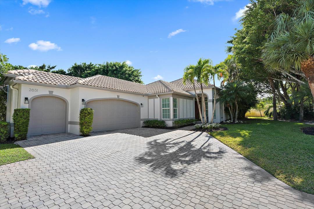 Nestled in the desirable Eagles Landing community of Palm Beach Polo Country Club, this fully remodeled 3 bedroom, 3.