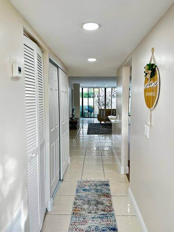 A must see ! This beautifully renovated 3 bedroom, 2 bathroom Village is in a gated, manned community.