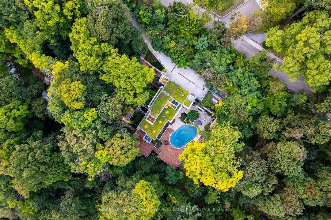 Rare opportunity to own one of the citys most iconic properties, nestled into the side of the Rosedale ravine.
