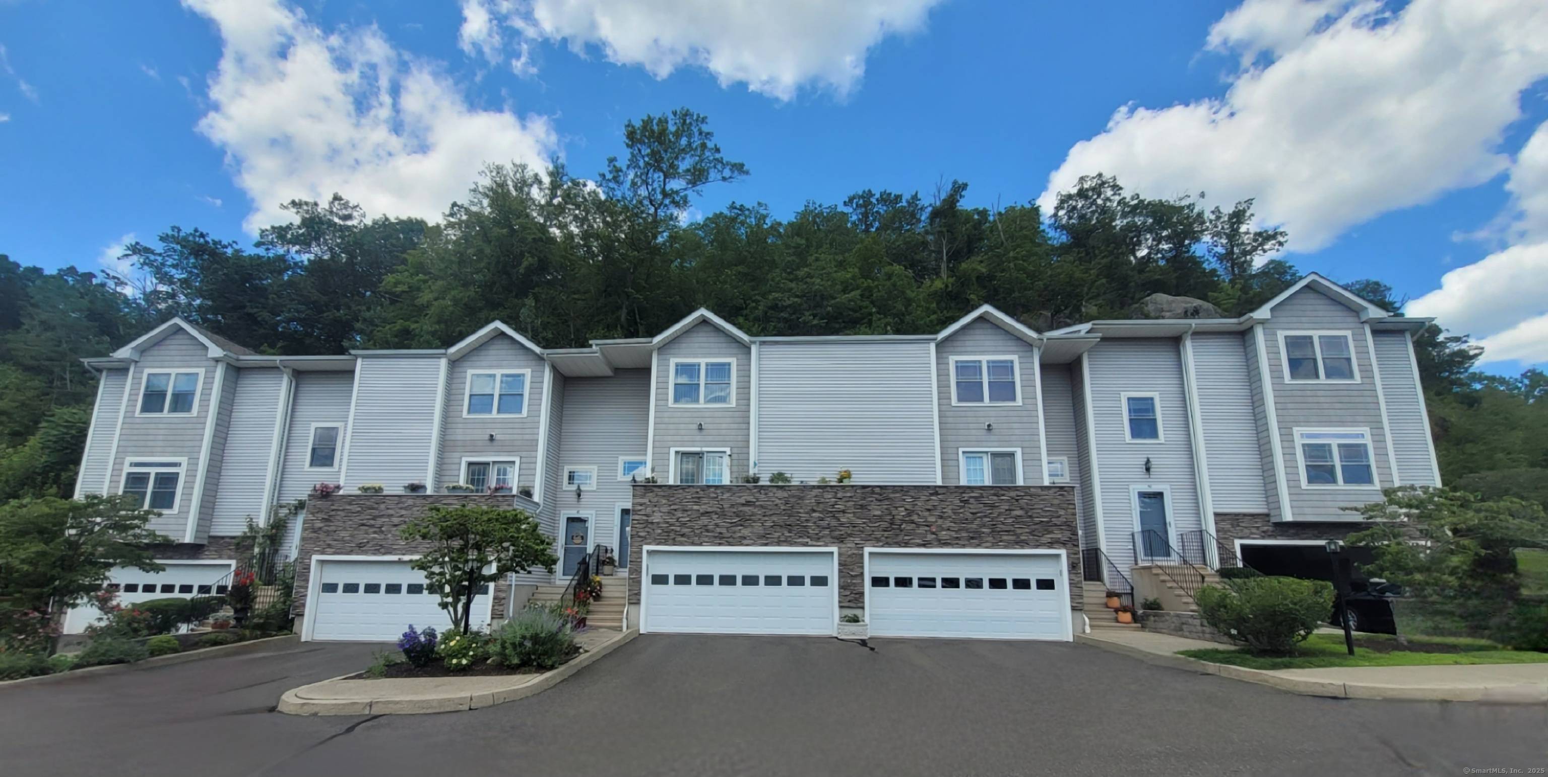 Welcome to 48 Stetson Place, a refined and beautifully maintained enclave of upscale townhomes.