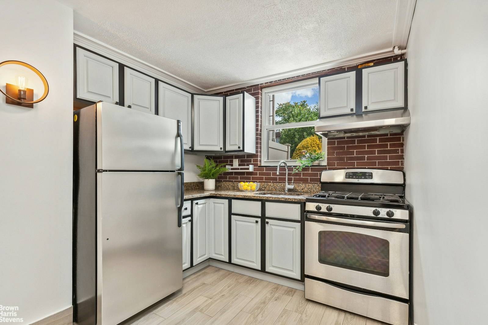 Just in Time this newly renovated first floor oversized one bedroom with garden patio.