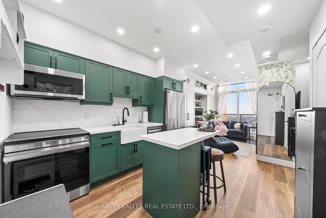 Welcome to suite 1305 of 4 Elsinore Path, a fully furnished one bedroom apartment that has been fully custom designed by the owner from top to bottom ; where modern ...