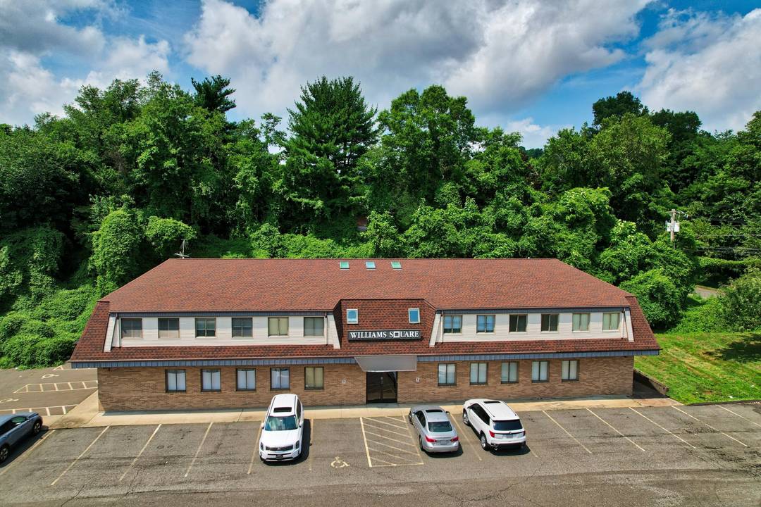 Beautiful corner lot office building in ideal, central location.