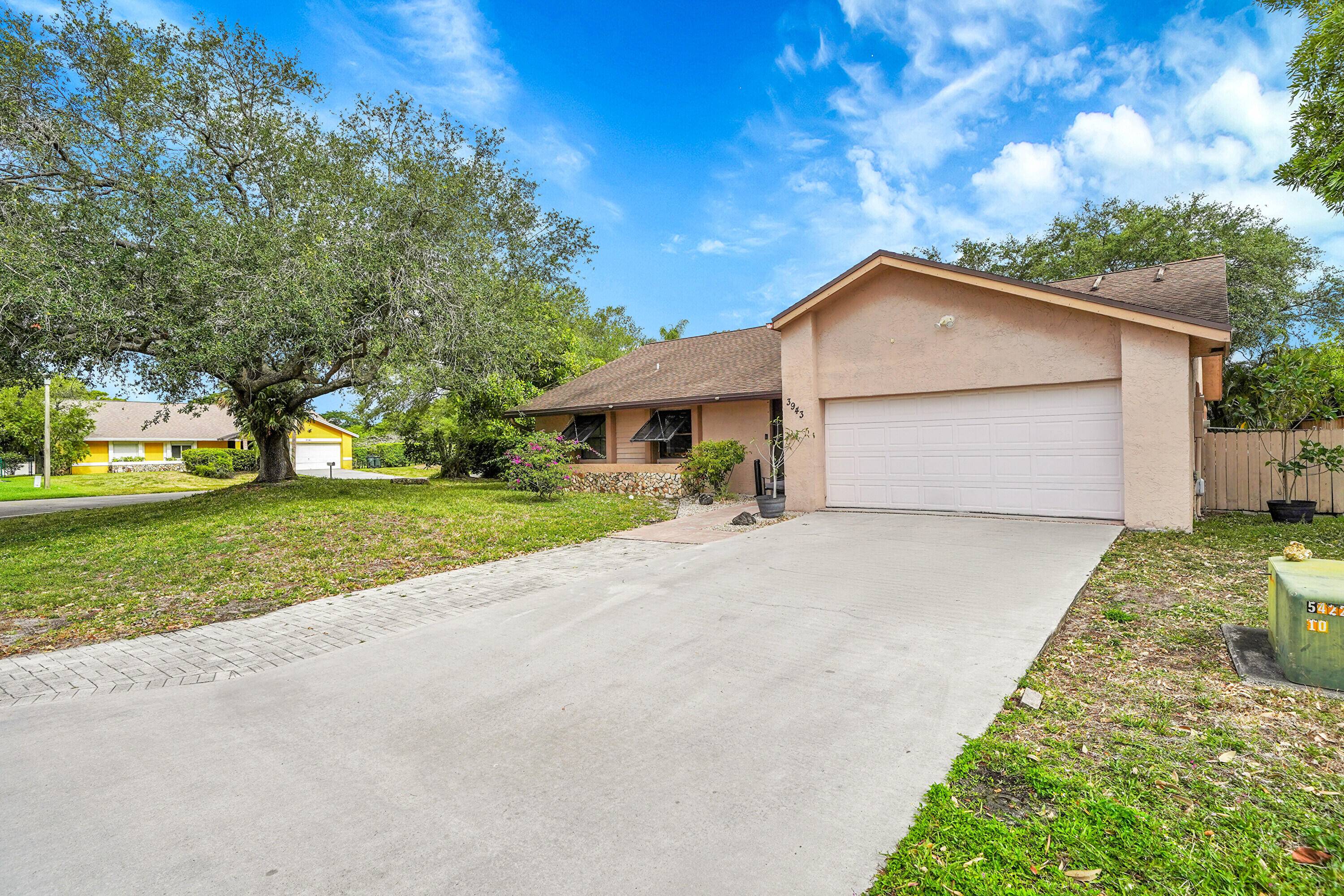 Beautifully updated 3 bedroom, 2 bath home located in the desirable Tartan Coconut Creek Phase 1 community.