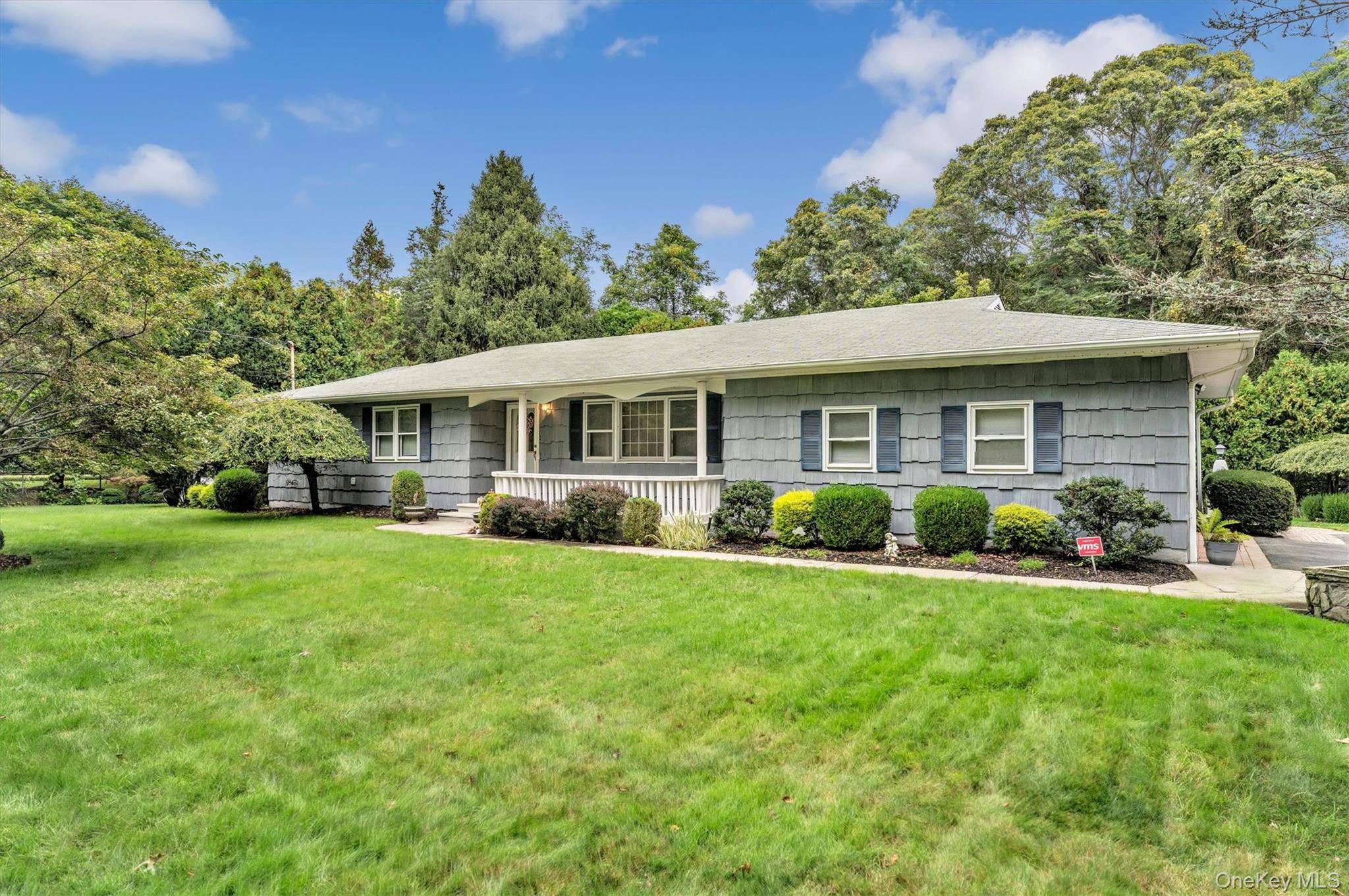 Tucked away in a private setting, 9 Old Barto Rd offers an exceptional 5 bedroom, 2 bath Ranch surrounded by natural beauty in the heart of desirable Brookhaven.
